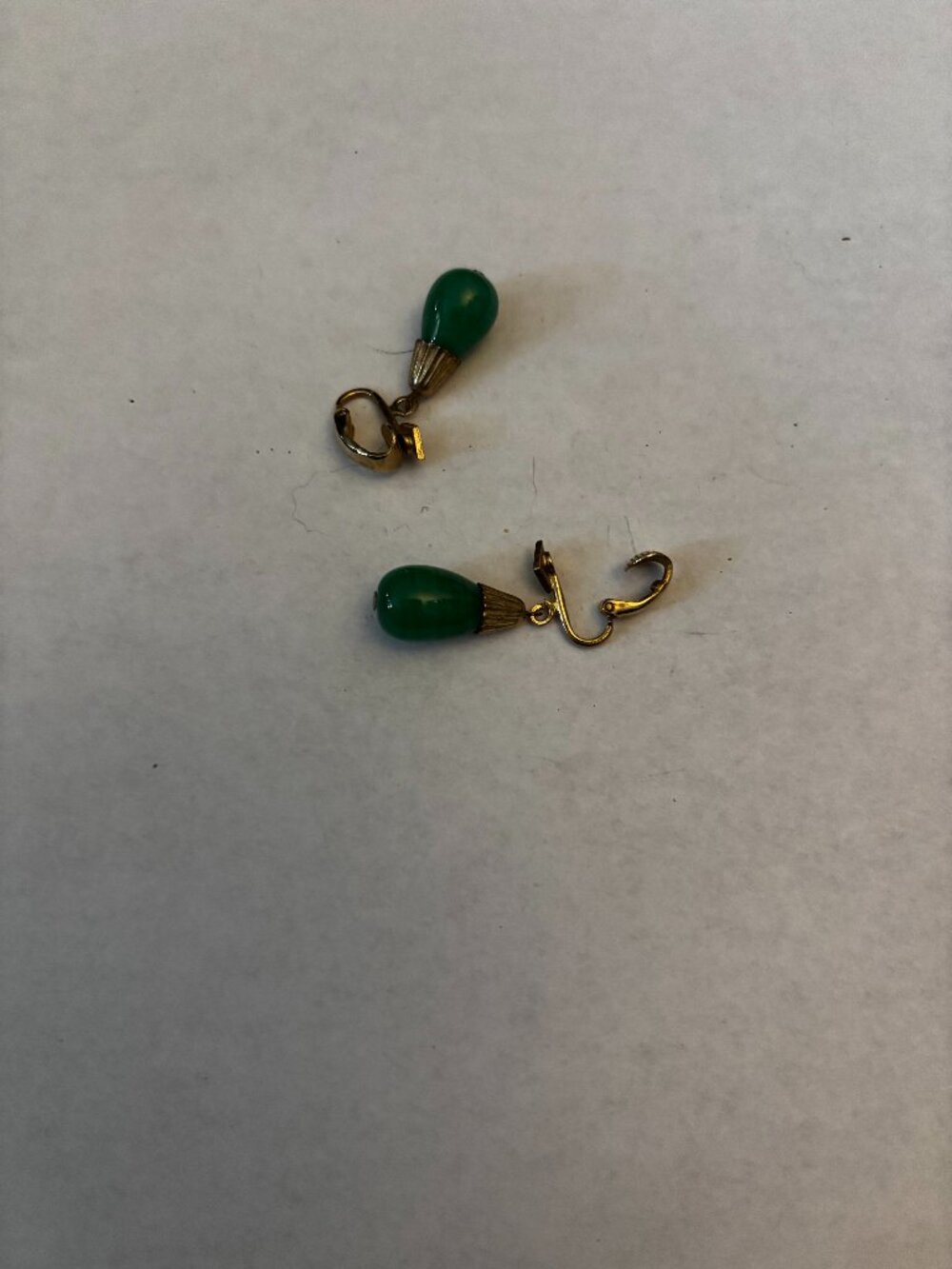 Clip on earrings gold tone green glass dangles